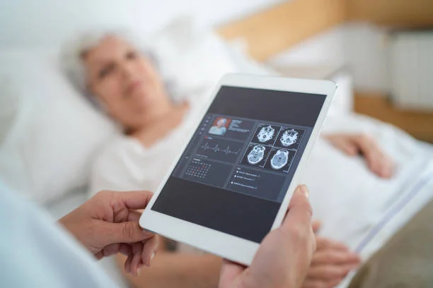 Close up of doctor using a digital tablet
